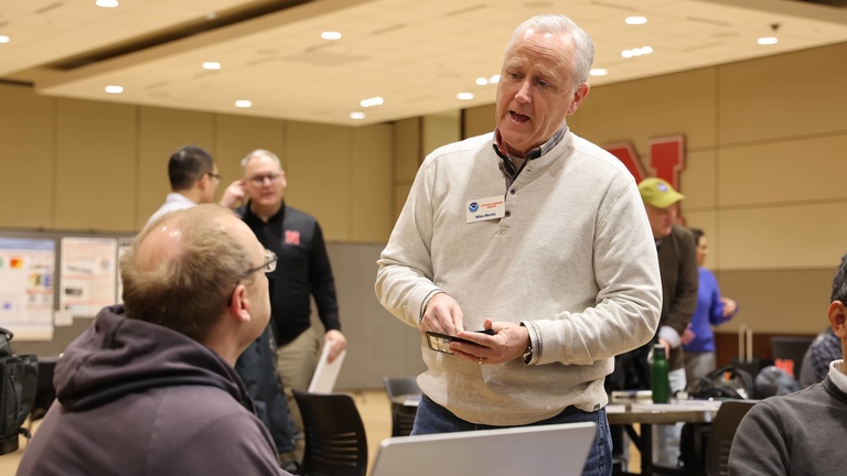 People talking at a conference