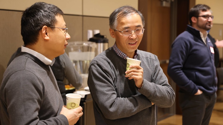 People talking at a conference