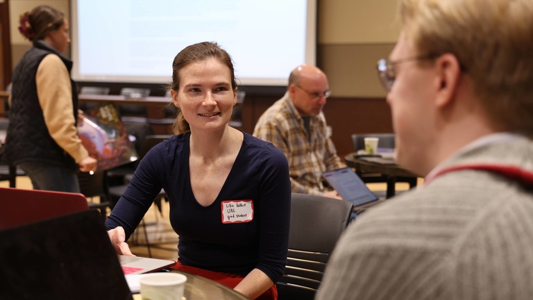 People talking at a conference