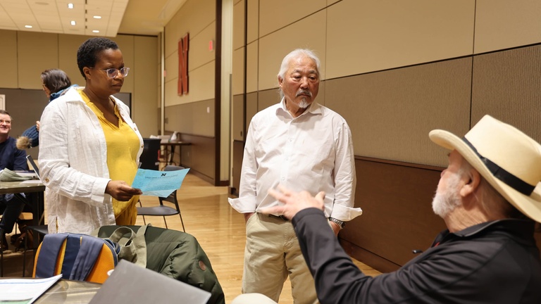 People talking at a conference