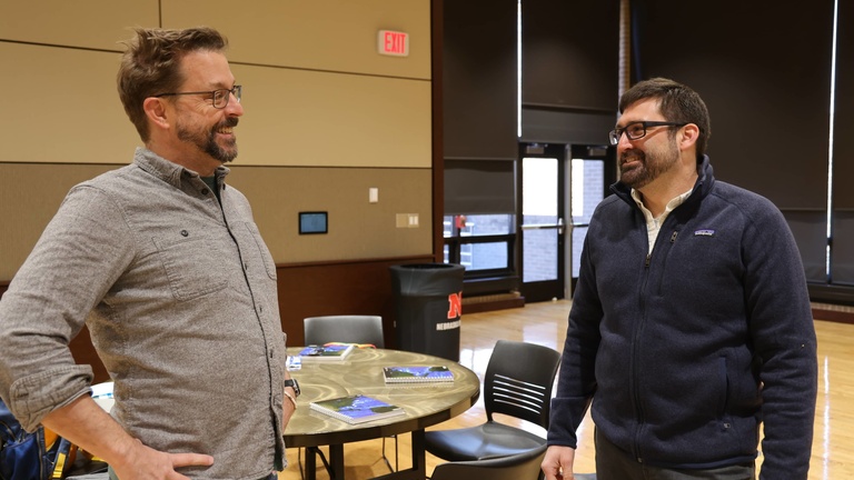 People talking at a conference